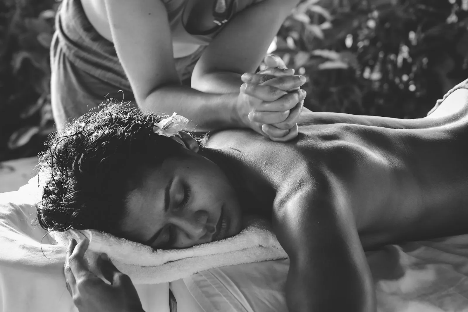 Deep tissue therapeutic massage in progress